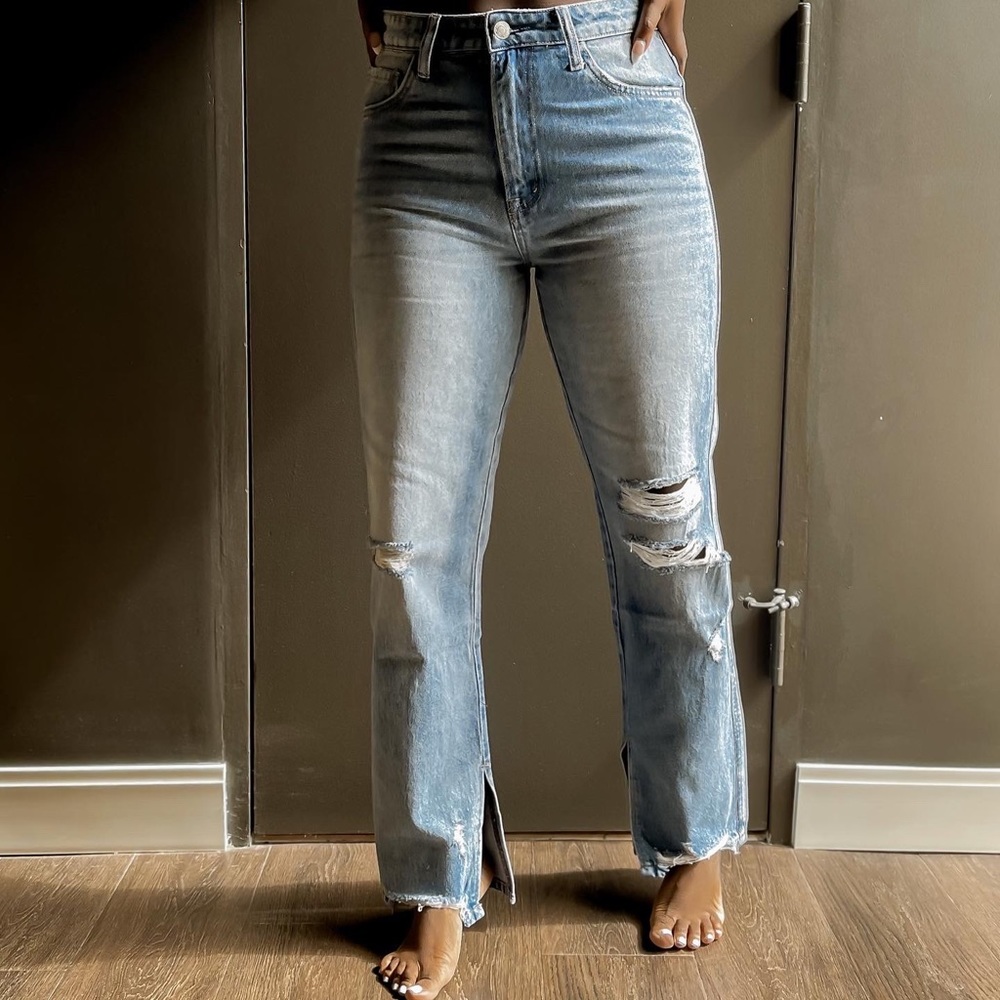 Distressed high waist denim with side slit